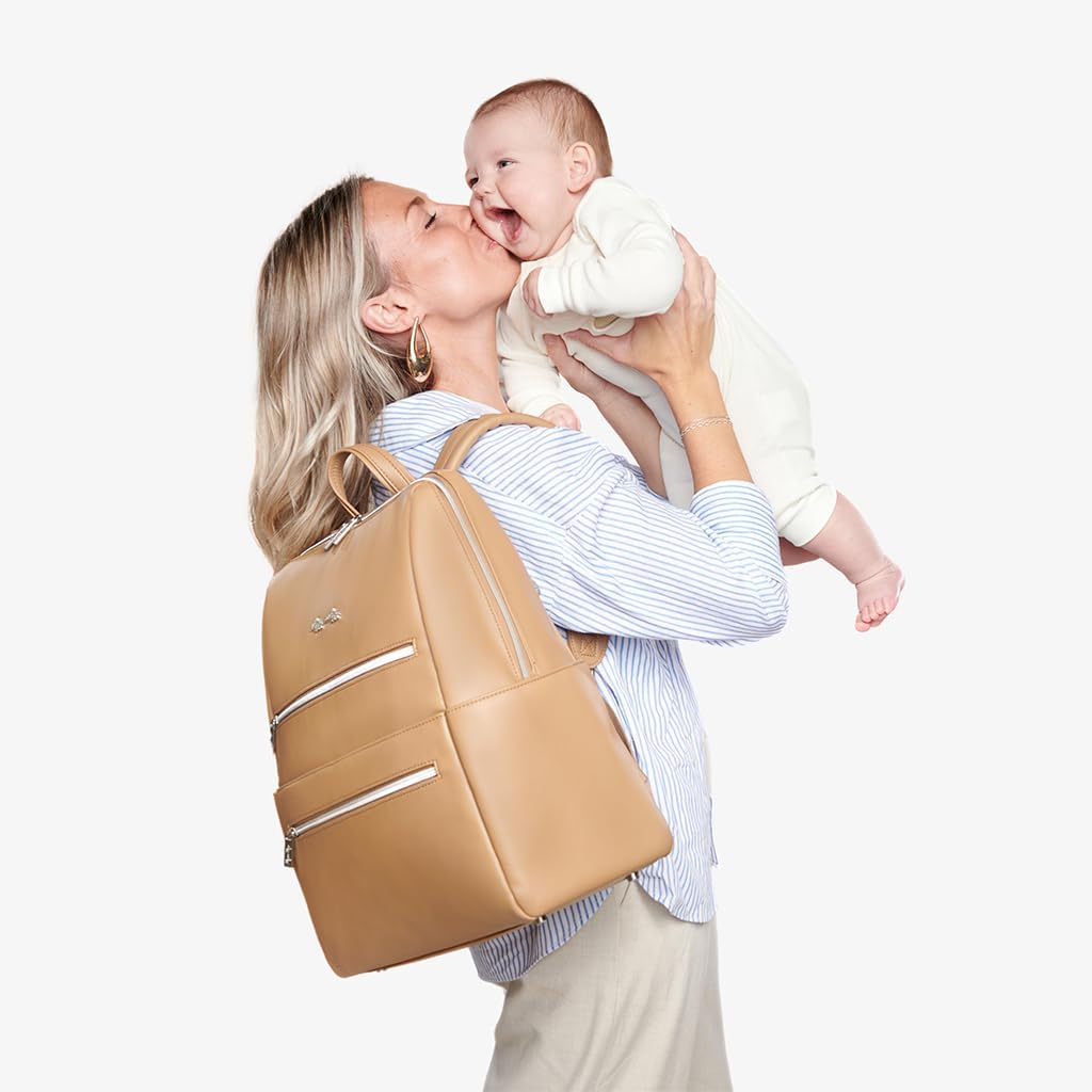 Itzy Ritzy Eras Diaper Bag Backpack – Large Capacity Backpack Diaper Bag Featuring Sleek Design, 15 Pockets, Changing Pad, Stroller Straps, and Luggage Sleeve (Chai)