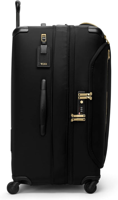 TUMI - Voyageur Leger 4 Wheeled Luggage - Women's Lightweight and Spacious, Sleek Silhouette, Durable Premium Suitcase - 29" Extended Trip Expandable Packing Case, Black with Gold Hardware