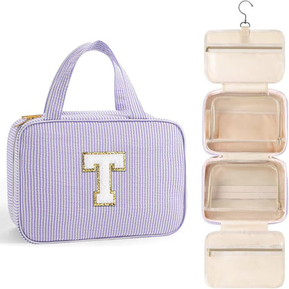 TOPEAST Hanging Toiletry Bag for Women - Travel Toiletry Bag Makeup Bag, Portable Toiletries Cosmetic Bag, Airplane Travel Essentials - Letter T, Purple