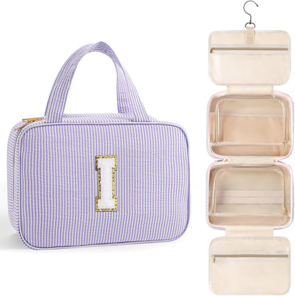 TOPEAST Travel Toiletry Bag for Women - Hanging Toiletry Bag Makeup Bag, Portable Toiletries Cosmetic Bag, Airplane Travel Essentials - Letter I, Purple