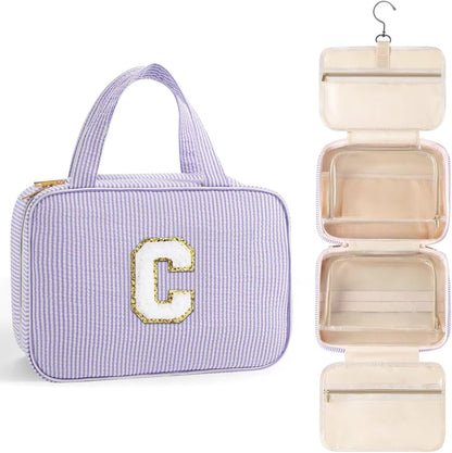 TOPEAST Hanging Toiletry Bag for Women - Travel Toiletry Bag Makeup Bag, Portable Toiletries Travel Bag and Cosmetic Bag, Airplane Travel Essentials - Letter C, Purple