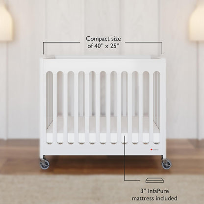 Foundations Boutique Folding Hotel Crib and Sheet Bundle - Includes Wooden Mini Crib with 3" Foam Mattress (White) and 6-Pack White Fitted Compact Sheets