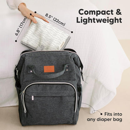 KeaBabies Portable Diaper Changing Pad, Easy Wipe Clean - Foldable Waterproof Baby Changing Mat for Diaper Bag, Compact, Lightweight, 25x13 Baby Changer Travel Essential, Machine Washable (Prism)