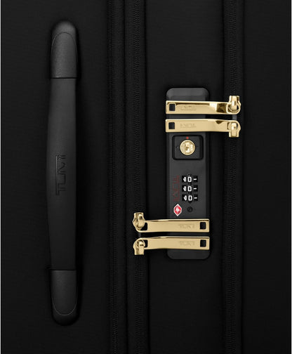 TUMI - Voyageur Leger 4 Wheeled Luggage - Women's Lightweight and Spacious, Sleek Silhouette, Durable Premium Suitcase - 29" Extended Trip Expandable Packing Case, Black with Gold Hardware