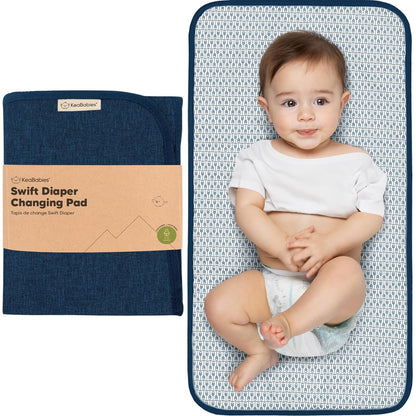 KeaBabies Portable Diaper Changing Pad, Easy Wipe Clean - Foldable Waterproof Baby Changing Mat for Diaper Bag, Compact, Lightweight, 25x13 Baby Changer Travel Essential, Machine Washable (Navy Blue)